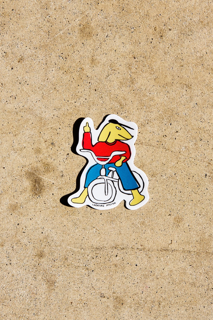 Autocollant "Chien à vélo"